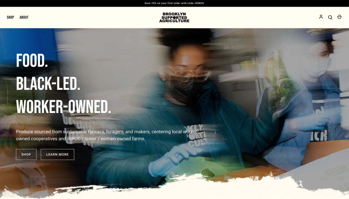 A website banner for Brooklyn Agriculture featuring a blurred photo of a worker in a blue jacket and face mask handling produce, with large text reading 'FOOD. BLACK-LED.